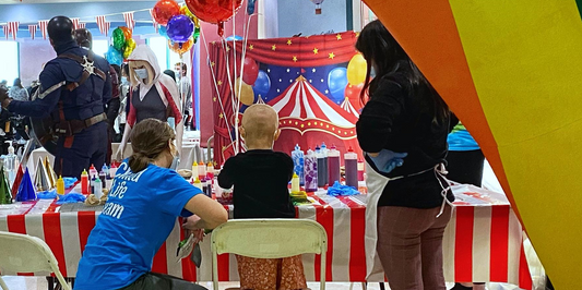 iLoveToCreate Volunteers Bring Colorful Fun to Valley Children's Child Life Month Carnival with Tie-Dye Station