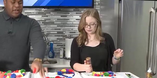 Woman on TV set tie dyeing shirt