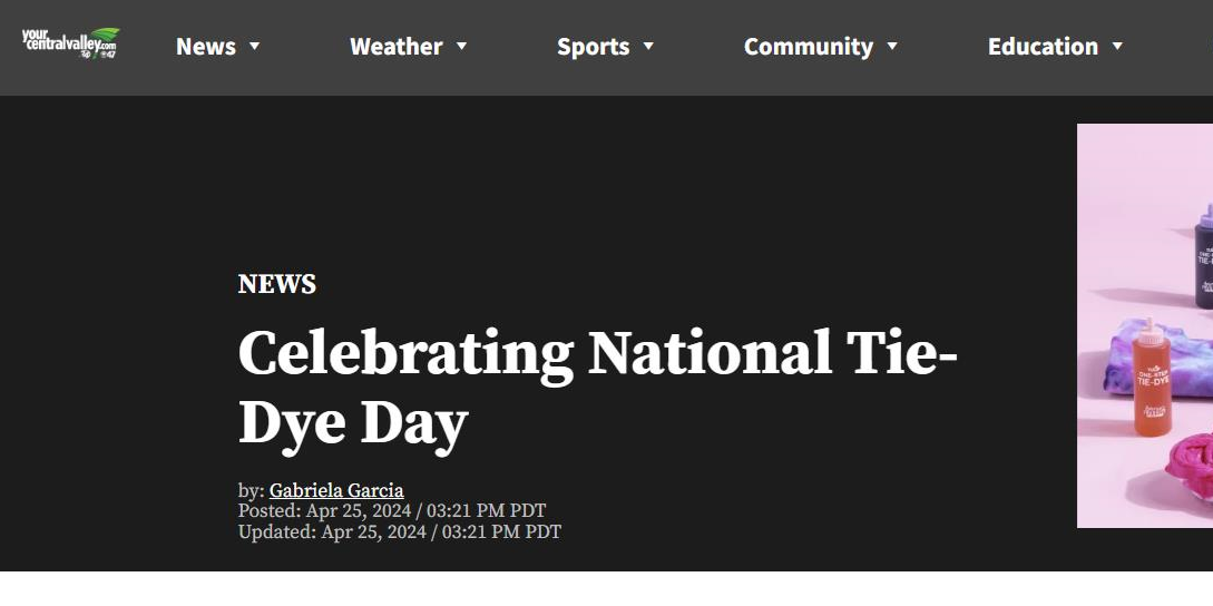 Black background screen shot of news article with headline "Celebrating National Tie Dye Day" and image with tie dye bottles and shirts with pink background