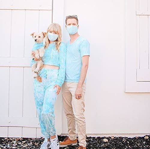 Couple and dog wearing tie dye